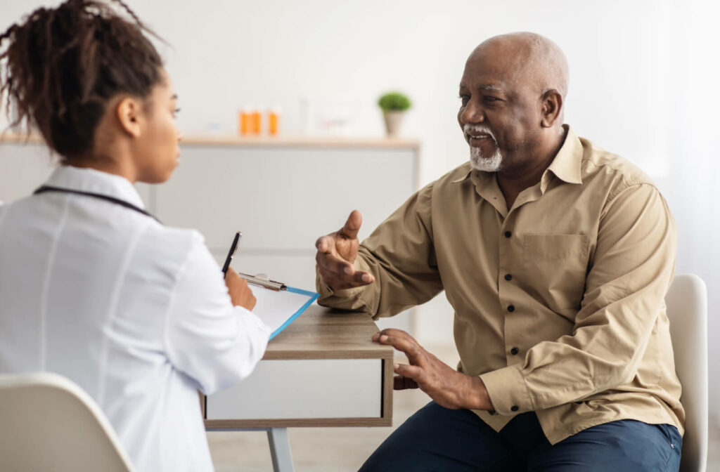 I think this should read: A doctor with a clipboard conducts a capacity assessment with a smiling senior patient.